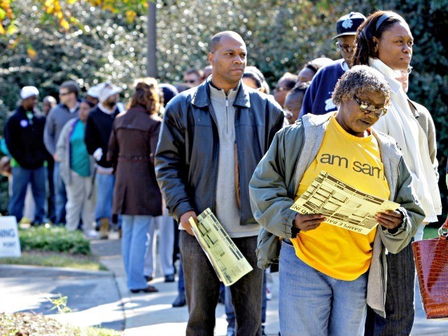 Voters stand in line at an early voting site in Charlotte, N.C., Thursday, Oct. 23, 2008. In three Southern states critical to deciding who will win the White House _ Georgia, Florida and North Carolina _ there are clear signs after several days of early voting that favor Democratic nominee …