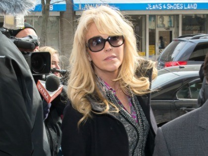 HEMPSTEAD, NY - MARCH 04: Dina Lohan appears at court for a hearing at Nassau County First
