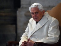 Pope Emeritus Benedict XVI arrives at St Peter's basilica before the opening of the "Holy Door" by Pope Francis to mark the start of the Jubilee Year of Mercy, on December 8, 2015 in Vatican. Pope Francis marks the start of an extraordinary Jubilee year for the world's 1.2 billion …