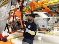 DETROIT - MAY 21: A Chrysler employee works on the assembly line making the new Jeep Grand Cherokee at the Chrysler Jefferson Avenue Plant May 21, 2010 in Detroit, Michigan. The 2011 Jeep Grand Cherokee is Chrysler's first new vehicle to be introduced since they emerged from bankruptcy. (Photo by …