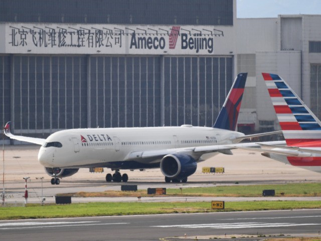 A Delta Airlines Airbus A350 aircraft waits to take off at Beijing airport on July 25, 201