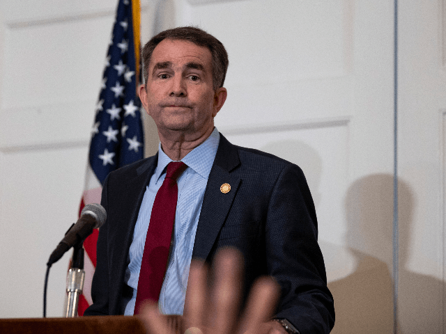 Virginia Governor Ralph Northam speaks with reporters at a press conference at the Governo