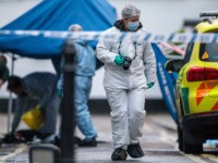 LONDON, ENGLAND - MARCH 07: Forensic officers on the scene following a stabbing in West Kensington on March 7, 2019 in London, England. A teenager has reportedly died from his injuries after being taken to hospital. (Photo by Jack Taylor/Getty Images)