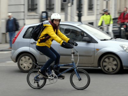 Illustration picture shows people riding their bicycle in the city center of Brussels, Fri