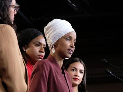 WASHINGTON, DC - JULY 15: U.S. Rep. Ilhan Omar (D-MN) speaks as Rep. Rashida Tlaib (D-MI), Rep. Ayanna Pressley (D-MA), and Rep. Alexandria Ocasio-Cortez (D-NY) listen during a press conference at the U.S. Capitol on July 15, 2019 in Washington, DC. President Donald Trump stepped up his attacks on four …