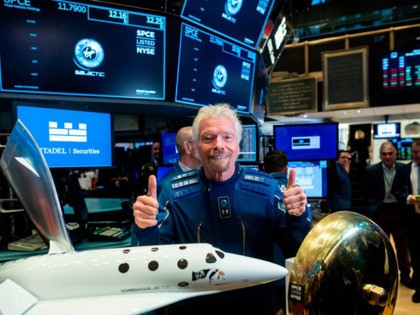 Richard Branson, Founder of Virgin Galactic poses before ringing the First Trade Bell to c