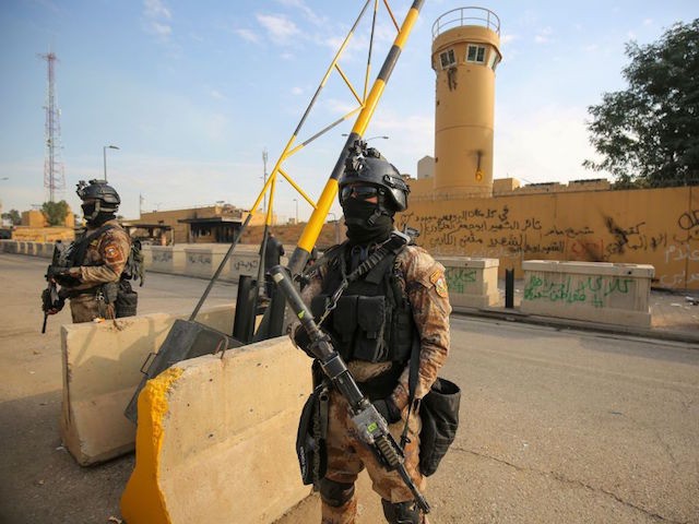 Iraqi counter-terrorism forces stand guard in front of the US embassy in the capital Baghdad on January 2, 2020. - The US embassy siege by pro-Iran protesters in Baghdad lasted just over a day, but analysts warn it could have lasting implications for Iraq's complex security sector and diplomatic ties. …