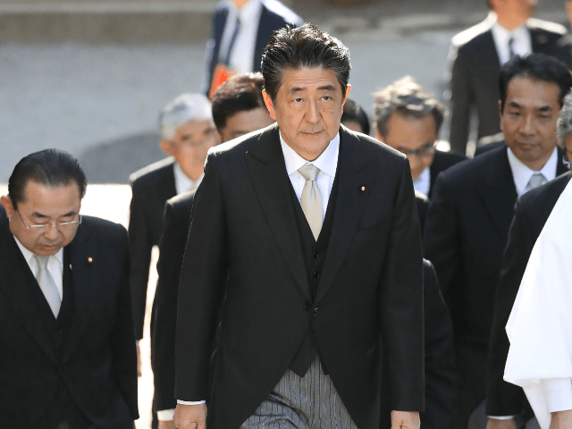 Japanese Prime Minister Shinzo Abe (C) visits Ise Jingu shrine in Ise, Mie prefecture on January 6, 2020. - Japan's Prime Minister Shinzo Abe, who has tried to carve out a role mediating between Washington and Tehran, said he was "deeply worried" by tensions in the Middle East. (Photo by …