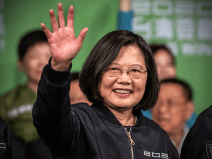 TAIPEI, TAIWAN - JANUARY 11: Tsai Ing-Wen waves after addressing supporters following her re-election as President of Taiwan on January 11, 2020 in Taipei, Taiwan. Tsai Ing-Wen of the Democratic Progressive Party (DPP) has been re-elected as Taiwans president as voters displayed their disapproval of Beijing by opting for a …