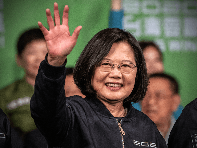 TAIPEI, TAIWAN - JANUARY 11: Tsai Ing-Wen waves after addressing supporters following her re-election as President of Taiwan on January 11, 2020 in Taipei, Taiwan. Tsai Ing-Wen of the Democratic Progressive Party (DPP) has been re-elected as Taiwans president as voters displayed their disapproval of Beijing by opting for a leader who had campaigned on defending their country from China. (Photo by Carl Court/Getty Images)