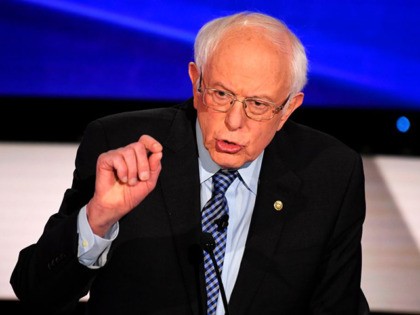 (L-R) Democratic presidential hopeful Vermont Senator Bernie Sanders speaks during the seventh Democratic primary debate of the 2020 presidential campaign season co-hosted by CNN and the Des Moines Register at the Drake University campus in Des Moines, Iowa on January 14, 2020. (Photo by Robyn Beck / AFP) (Photo by …