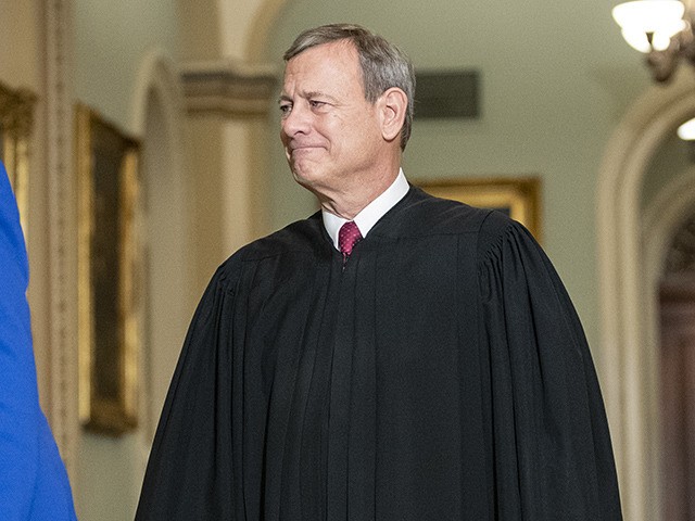 WASHINGTON, DC JANUARY 16: (L-R) Sen. Dianne Feinstein (D-CA) and Supreme Court Chief Justice John Roberts arrive to the Senate chamber for impeachment proceedings at the U.S. Capitol on January 16, 2020 in Washington, DC. On Thursday, the House impeachment managers will read the articles of impeachment against President Trump …