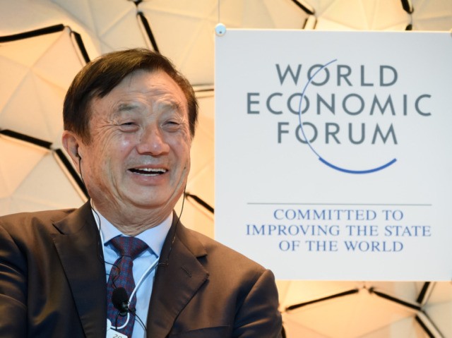 Huawei CEO Ren Zhengfei attends a session at the Congress center during the World Economic