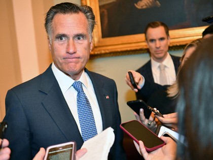 Sen. Mitt Romney(R-UT) speaks to reporters as he arrives for the Senate impeachment trial of US President Donald Trump at the US Capitol in Washington, DC, January 21, 2020. - Senate Republican Majority Leader Mitch McConnell is organizing a "rigged" impeachment trial for Donald Trump and working "in concert" with …