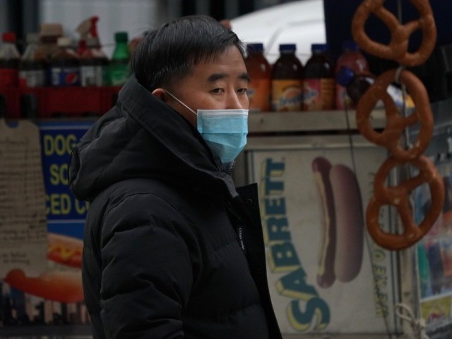 A man wears a protective mask near the Chinatown section of New York City on January 23, 2