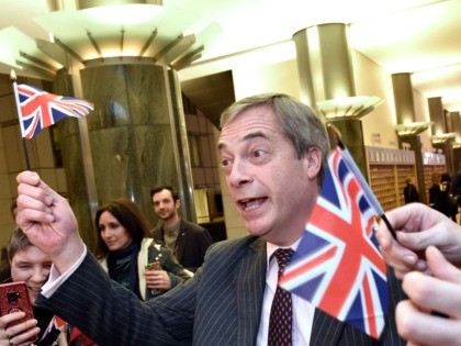 Britain's Brexit Party leader Nigel Farage waves a Union flag as he speaks to the press after the European Parliament ratified the Brexit deal in Brussels on January 29, 2020. - The European Parliament on January 29 voted overwhelmingly to approve the Brexit deal with London, clearing the final hurdle …