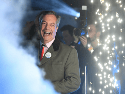 Brexit Party leader Nigel Farage smiles on stage in Parliament Square, venue for the Leave Means Leave Brexit Celebration as 11 O'Clock passes, in central London on January 31, 2020, the moment that the UK formally left the European Union. - Brexit supporters gathered outside parliament on Friday to cheer …