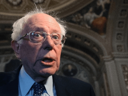 Democratic presidential candidate Sen. Bernie Sanders (I-VT) speaks to reporters before attending the Senate impeachment trial at the U.S. Capitol, on January 29, 2020 in Washington, DC. Wednesday begins the question-and-answer phase of the impeachment trial that will last up to 16 hours over the next two days. (Photo by …