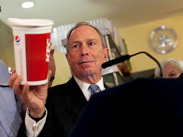 NEW YORK, NY - MARCH 12: New York City Mayor Michael Bloomberg holds a large cup as he speaks to the media about the health impacts of sugar at Lucky's restaurant, which voluntarily adopted the large sugary drink ban, March 12, 2013 in New York City. A state judge on Monday blocked Bloomberg's ban on oversized sugary drinks but the Mayor plans to appeal the decision. (Photo by Allison Joyce/Getty Images)