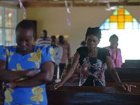Anglican Church goers in Garissa observe a moment of silence and prayer for those who lost their lives in the terrorist attack on Garissa University, mourning the country's worst ever massacres, on April 5, 2015. Kenyans prayed for unity on April 5 at the start of three days of national …