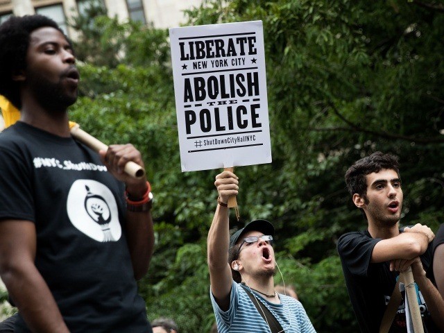 NEW YORK, NY - AUGUST 1: Protestors rally during a protest against police brutality at Cit