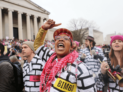 A woman chants while attending the Women's March on Washington on January 21, 2017 in Wash