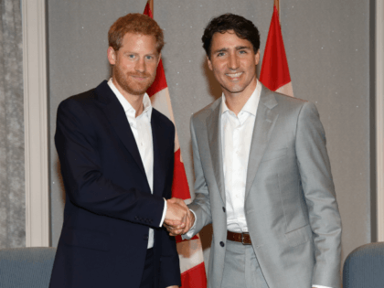 TORONTO, ON - SEPTEMBER 23: Prince Harry shakes hands with Canadian Prime Minister Justin