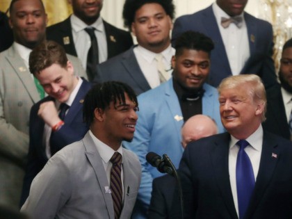 Wide Receiver Ja'Marr Chase speaks while U.S. President Donald Trump listens, during an event to honor the champion Louisiana State University football team in the East Room at the White House, on January 17, 2020 in Washington, DC. This past Monday the LSU Tigers defeated Clemson 42 to 25 in the …