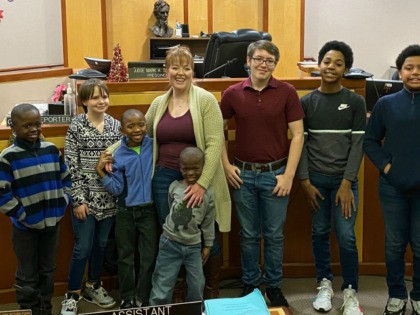 Jessica Benzakein adopted six young boys she's been fostering in Milwaukee, Wisconsin. She already has two biological children.