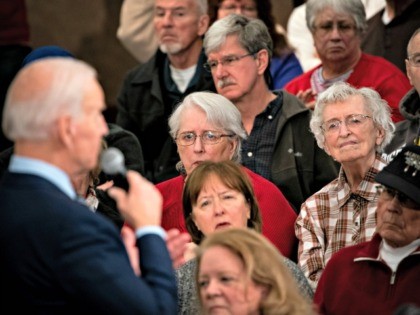 AMES, IA - JANUARY 21: People listen as Democratic presidential candidate, former Vice President Joe Biden speaks during an event on January 21, 2020 in Ames, Iowa. With less than two weeks to go until the Iowa caucus, the candidates are making their case to voters in the state of …