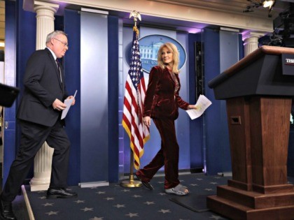 WASHINGTON, DC - JANUARY 30: White House Senior Counselor Kellyanne Conway and Director of Office of National Drug Control Policy Jim Carroll approach the podium for a news briefing at the James Brady Press Briefing Room of the White House January 30, 2020 in Washington, DC. Trump Administration officials held …