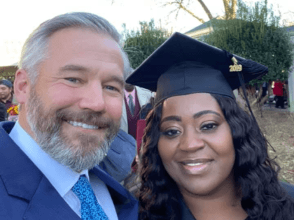 Kevin Esch and Latonya Young on her graduation day