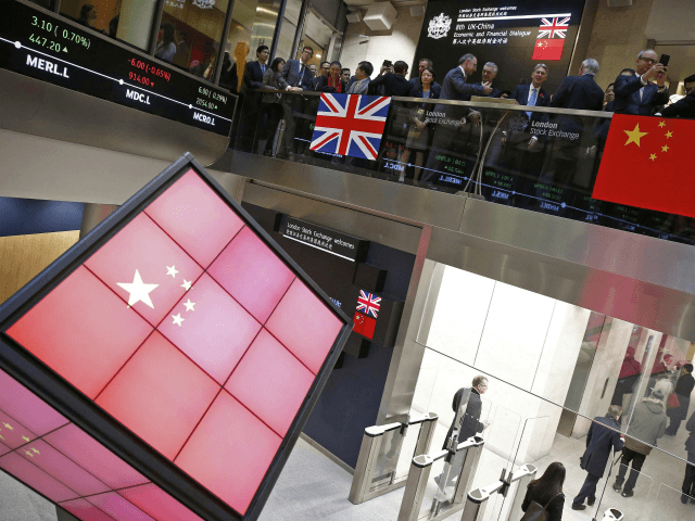 An illuminated cube bearing the Chinese flag is pictured in the entrance foyer of the Lond