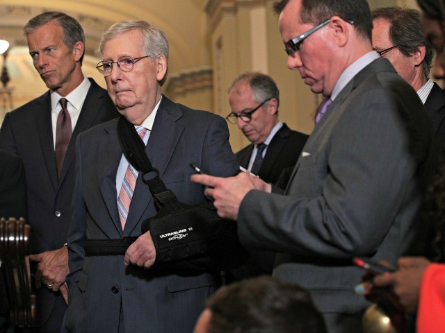 WASHINGTON, DC - SEPTEMBER 10: U.S. Senate Majority Leader Sen. Mitch McConnell (R-KY) and Senate Majority Whip Sen. John Thune (R-SD) listen during a news briefing after the weekly Senate Republican policy luncheon September 10, 2019 at the U.S. Capitol in Washington, DC. Senate GOPs held the weekly luncheon to …