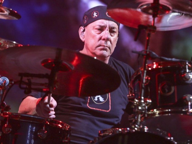 FILE - This Aug. 1, 2015 file photo shows Neil Peart of Rush performing during the final s