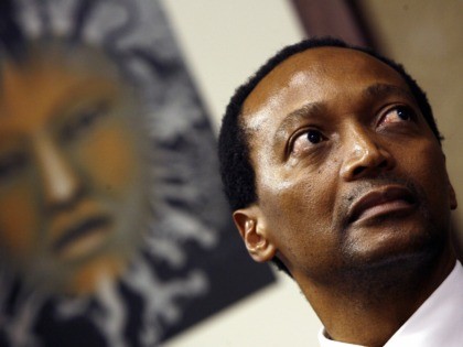 South African businessman and outgoing Business Unity South Africa (BUSA) president Patrice Motsepe looks on while listening to unseen newly appointed BUSA president Brian Molefe speak on May 07, 2008 at the BUSA headquarters in Sandton. The new head of South African business group BUSA said on May 7, he …