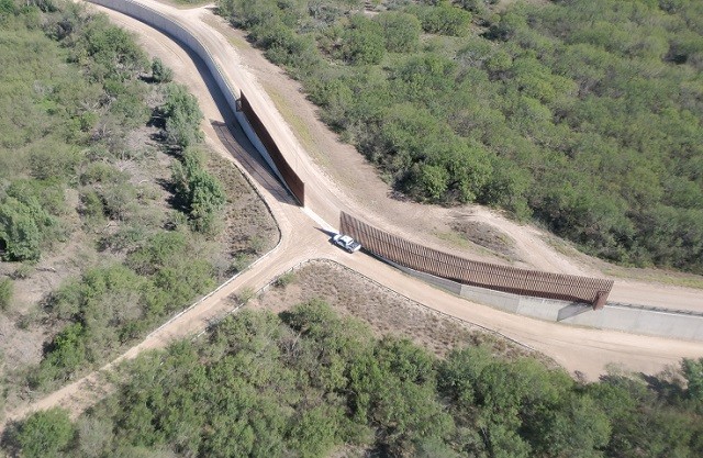 During a border orientation flight provided by CBP Air and Marine Operations, Breitbart News observed some border wall gaps are manned while others are not. (Photo: Bob Price/Breitbart Texas)
