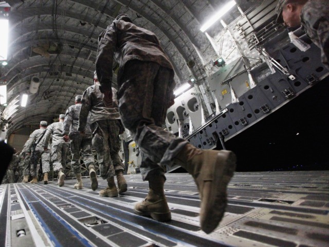 NASIRIYAH, IRAQ - DECEMBER 17: Soldiers from the 3rd Brigade, 1st Cavalry Division board a