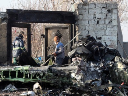 EDITORS NOTE: Graphic content / Rescue teams work amidst debris after a Ukrainian plane carrying 176 passengers crashed near Imam Khomeini airport in the Iranian capital Tehran early in the morning on January 8, 2020, killing everyone on board. - The Boeing 737 had left Tehran's international airport bound for …