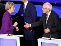 Democratic presidential candidate Sen. Elizabeth Warren, D-Mass., left and Sen. Bernie Sanders, I-Vt. talk Tuesday, Jan. 14, 2020, after a Democratic presidential primary debate hosted by CNN and the Des Moines Register in Des Moines, Iowa. (AP Photo/Patrick Semansky)