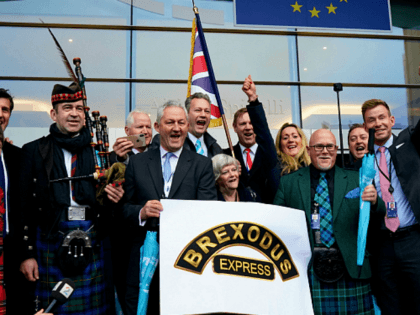 British members of the European Parliament from the Brexit Party pose for a photograph as they leave the European Parliament, in Brussels on January 31, 2020 on the Brexit day. - Britain's departure from the European Union was set in law on January 29, amid emotional scenes, as the bloc's …