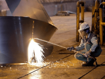 In this May 31, 2012 file photo, an Iranian worker cuts a steel roll at the Mobarakeh Steel Complex, some 280 miles (460 kilometers) south of the capital Tehran, and some 40 miles, 65 kilometers, southwest of central Iranian city of Isfahan. President Donald Trump ordered new sanctions on Iran …