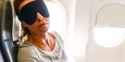 Woman Sleeping on Plane