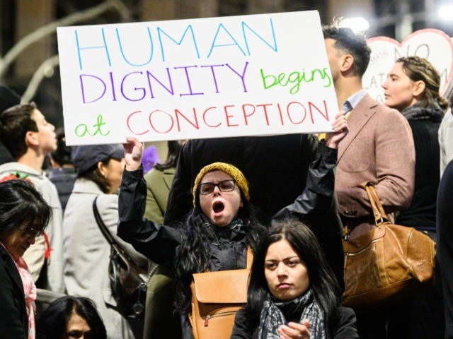 SYDNEY, AUSTRALIA - AUGUST 20: Pro-Life protestors demonstrating on August 20, 2019 in Martin Place, Sydney, Australia. The protesters oppose the NSW abortion bill which will decriminalise Abortion. The rally organisers say it will allow abortion for any reason until birth and won’t prevent sex selection terminations. A vote on …