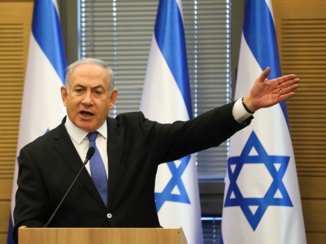 FILE - In this Wednesday, Nov. 20, 2019 file photo, Israeli Prime Minister Benjamin Netanyahu speaks during an extended faction meeting of the right-wing bloc members at the Knesset, in Jerusalem. Israel’s attorney general has formally charged Netanyahu in a series of corruption scandals. Attorney General Avichai Mandelblit issued an …