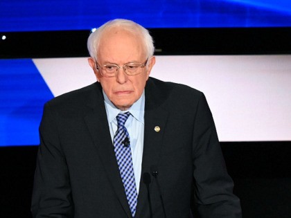 Democratic presidential hopefuls Vermont Senator Bernie Sanders (L), Mayor of South Bend,