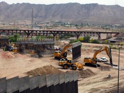 Workers build a border fence in a private property located in the limits of the US States of Texas and New Mexico taken from Ciudad Juarez, Chihuahua state, Mexico on May 26, 2019. (Photo by HERIKA MARTÍNEZ / AFP) (Photo credit should read HERIKA MARTINEZ/AFP via Getty Images)