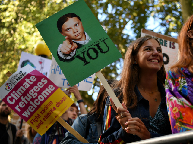 TOPSHOT - Environmental activists rally during the UK Student Climate Network's Global Climate Strike protest action in central London, on September 20, 2019. - Millions of people are taking to the streets across the world in what could be the largest climate protest in history. (Photo by Ben STANSALL / AFP) (Photo credit should read BEN STANSALL/AFP via Getty Images)