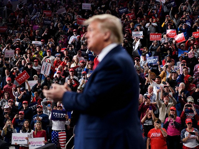 Supporters cheer for US President Donald Trump as he arrives for a Keep America Great rally at the Giant Center in Hershey, Pennsylvania on December 10, 2019. (Photo by Brendan Smialowski / AFP) (Photo by BRENDAN SMIALOWSKI/AFP via Getty Images)