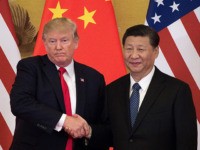 US President Donald Trump (L) shakes hands with China's President Xi Jinping at the end of a press conference at the Great Hall of the People in Beijing on November 9, 2017. Donald Trump urged Chinese leader Xi Jinping to work "hard" and act fast to help resolve the North …